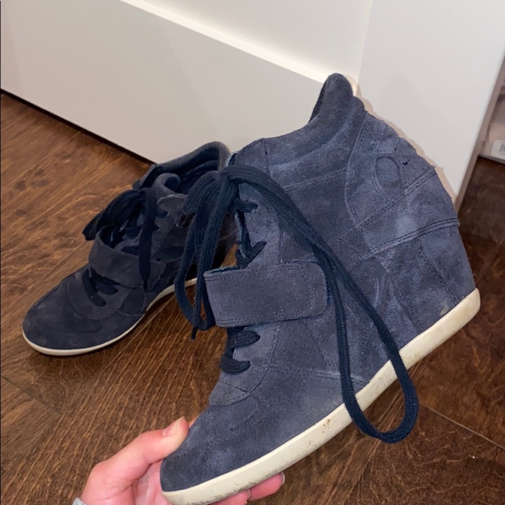 Navy blue wedged sneakers.
